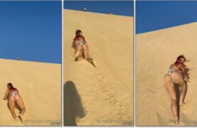 Maria Eugênia arrasando, caminhando com todo estilo pelas dunas devagar e destacando suas curvas